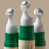 Close-up of Vegan Collagen Eye Serum applicators, featuring a cooling metal tip for precise and soothing application around the eyes.